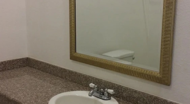 Четырёхместный люкс Deluxe Country Regency Inn & Suites