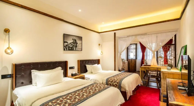 Четырёхместный номер Deluxe Bliss Qintai Tibetan Boutique Hotel