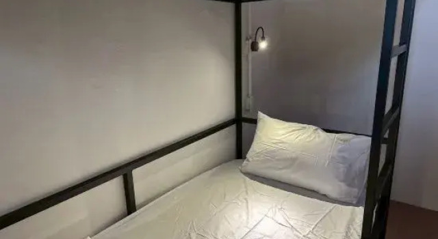 Кровать в общем номере (мужской номер) WD Kuixing Backpacker Hostel