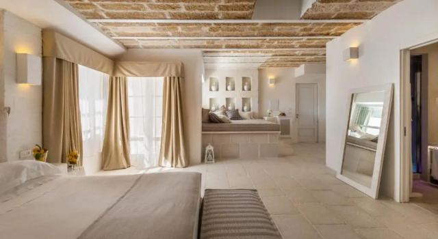 Junior-Suite mit Blick auf den Sonnenuntergang Baglioni Masseria Muzza