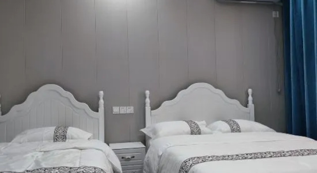 Двухместный люкс Huaqingchi Homestay