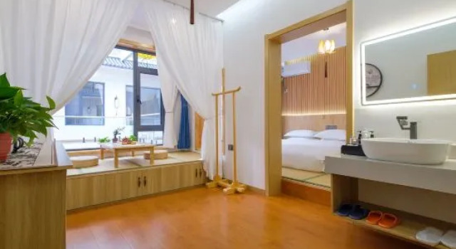 Двухместный люкс Deluxe Wutai Mountain Jiuduolian Homestay