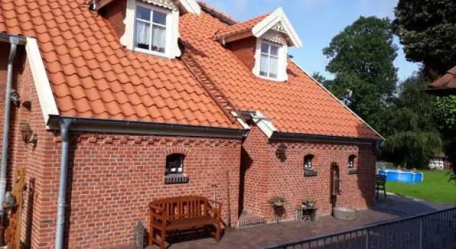 Ferienwohnung Achterhuus, Забронировать Отель Раудерфен East Frisia
