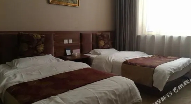 Millennium Inn, Varaa Hotelli Zhenlai Jilin