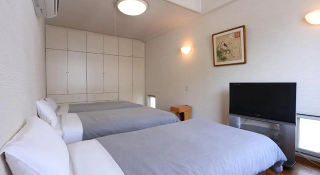Трёхместный номер Economy Shinnishiki Hotel