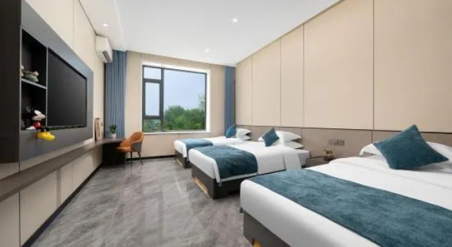 Кровать в общем номере All Seasons Boutique Homestay