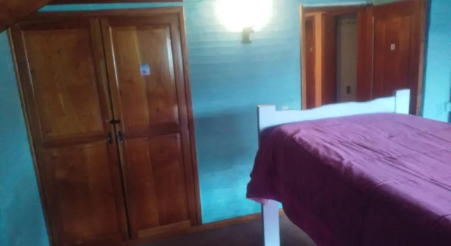 Кровать в общем номере Universal Travellers Hostel