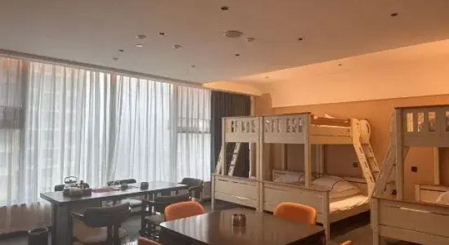 Кровать в общем номере H E-sports Hotel