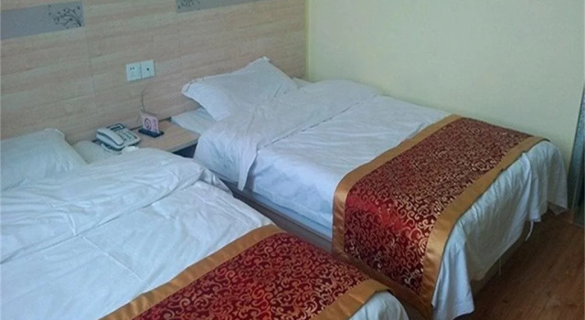 Dehou Xingyu Guest House, Book Pension Hoteller i Dezhou med parkering, Parkering