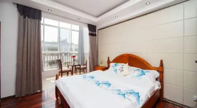 Люкс с 2 комнатами с балконом Tengchong Jiajing Garden Homestay