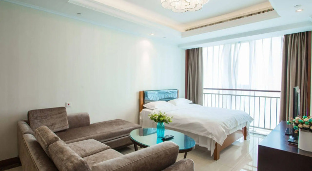 Qingdao Jinshan We Holiday Apt Wusi, Забронировать Отель Бизнес-отели Шаньдун, 4* 5*