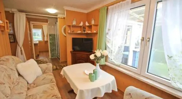 Ferienhaus mit Ruderboot Kummerow, Забронировать Апартаменты/квартира Куммеров Мекленбург-Померания