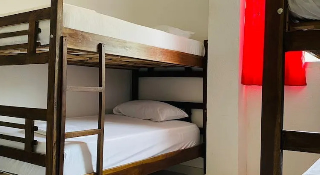 Кровать в общем номере Casa Guiwa Hostel