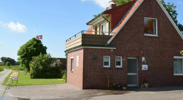 The captain's house in Nesse, Забронировать Отель Отели Дорнум с парковкой, Парковка