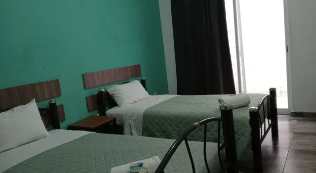 Кровать в общем номере La Siesta del Patron