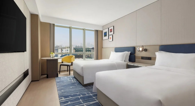 Четырёхместный номер Standard voco Suzhou Guanqian Street by IHG