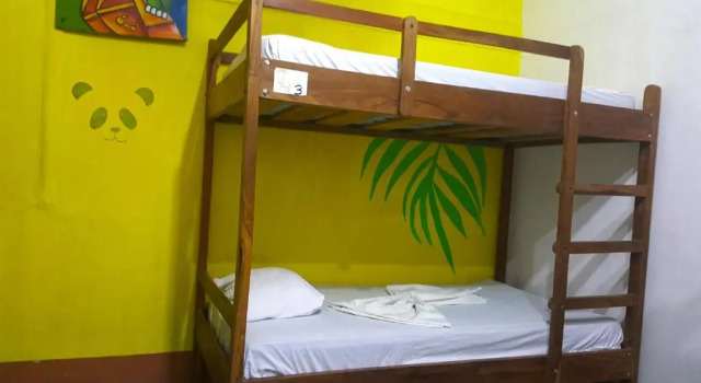 Кровать в общем номере Hostal Casa Moreno