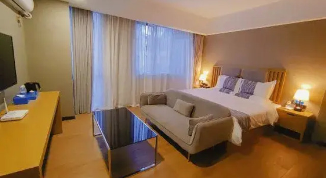 Двухместный семейный люкс Deluxe Yestour Hotel (Jingxi Xiyue Xiangshan)