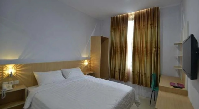 T-One Hotel, Забронировать Отель Джамби провинция Джамби