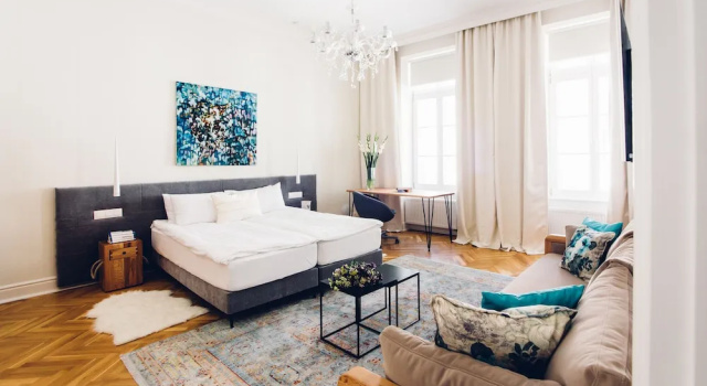 Grand cameră Adele Apartments