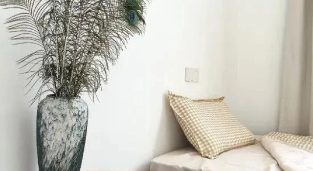 Кровать в общем номере Mangshi Youwang Hostel