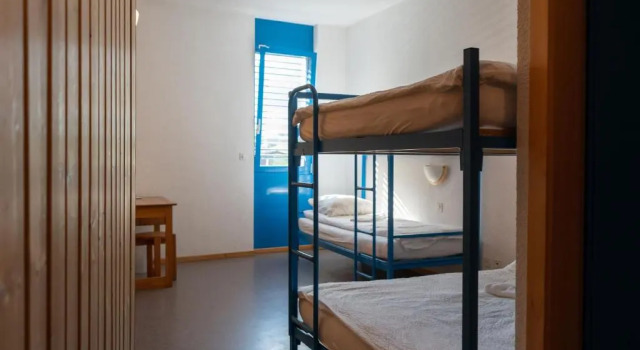 Кровать в общем номере Mont-Fort Swiss Lodge