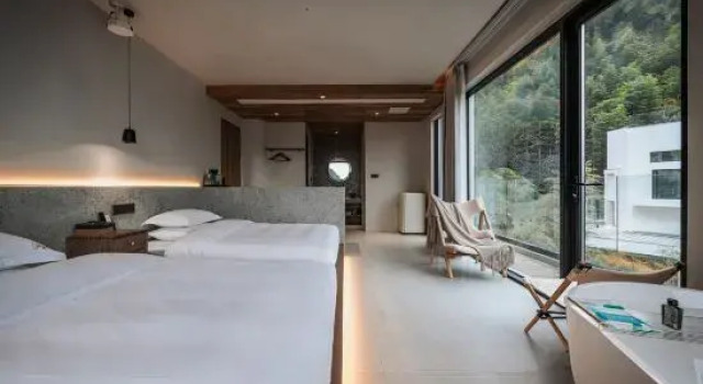 Кровать в общем номере Qingshanli Wentang SHAN Limei Villa