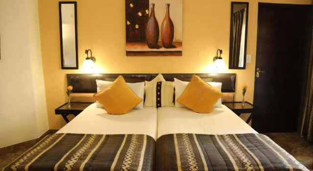 Villa Ticino Guesthouse, Reservar Vila Moradias em Sabie Airport, Vila