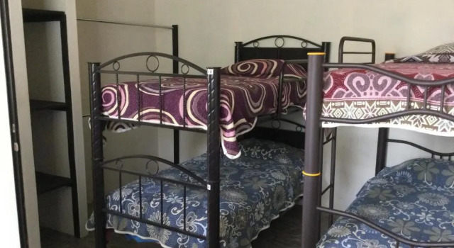Кровать в общем номере Trotamundo Oaxaca Hostel