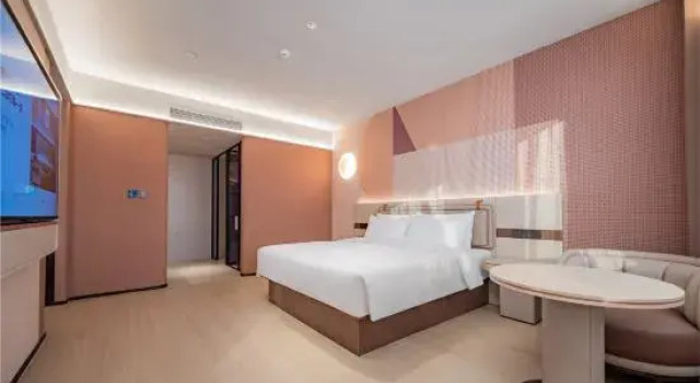 Люкс Deluxe Orange Hotel (Jiaxing Road Food Street Branch, Shihao Plaza, Central District, Leshan City)