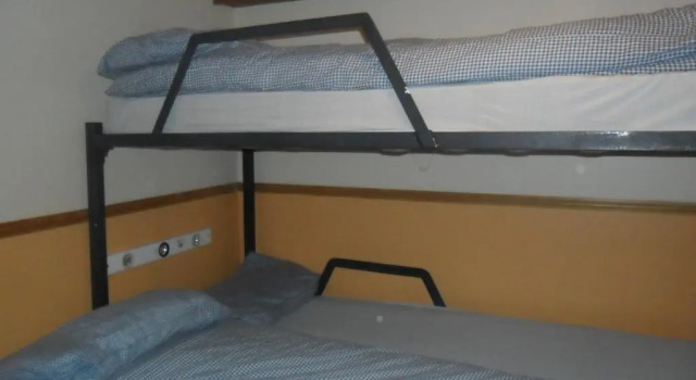 Кровать в общем номере Sandras Backpackers