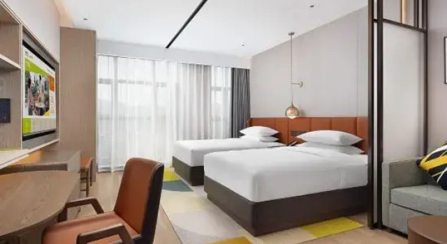 Капсула Home2 Suites by Hilton Xingyi Jushan Plaza