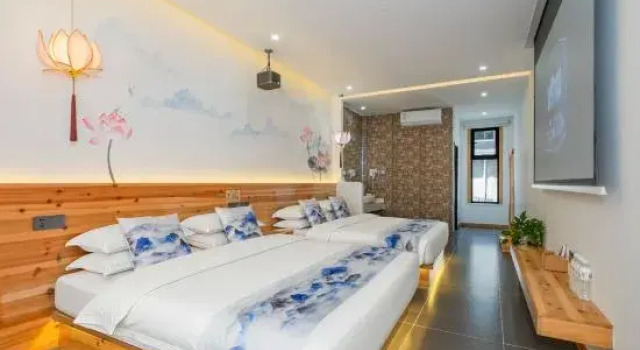 Кровать в общем номере Yicaoyimu B&B (Wutaishan Scenic Area Branch)