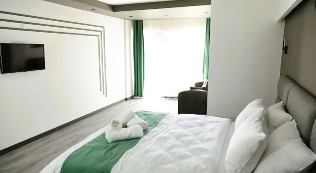 Четырёхместный номер Deluxe Aybek Ratio Hotel
