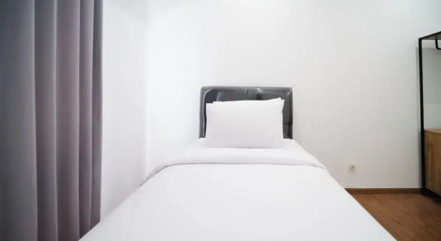 Апартаменты Exclusive and Spacey 3BR at Grand Sungkono Lagoon Apartment By Travelio