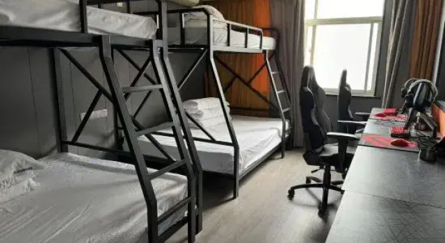 Кровать в общем номере Haiwan E-sports Homestay (Guogou)