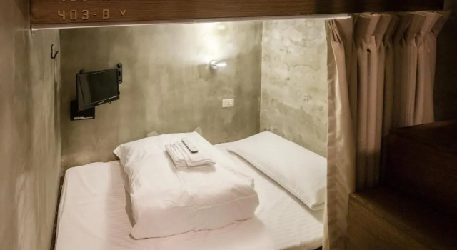Кровать в общем номере Jian Shan Hotel