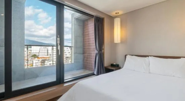 Двухместный полулюкс GreenTree Inn Express Hotel (Haiyan Wuyue Plaza)