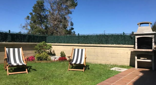 Апартаменты apartamento con jardín privado y barbacoa a 5 min playas santander
