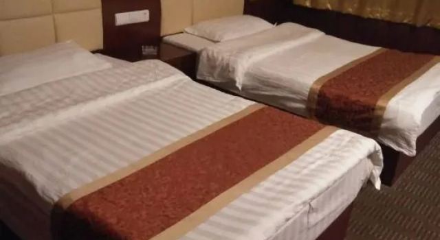 Huangqi Amulun Business Hotel, Buchen Sie Hotel Xin Bulag China