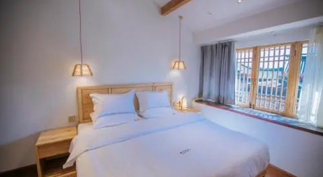 Lijiang Shushi Zhengliu Mujiayuan Hotel, Забронировать Отель Лицзян Юньнань, рядом с Улица Сквер-стрит Древнего города Даянь