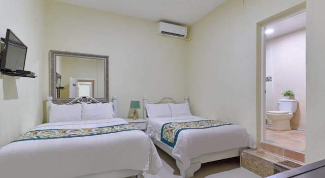 Четырёхместный номер Standard Hotel y Villas Salamar