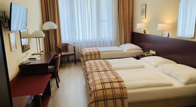 Трёхместный номер Continental Hotel-Pension
