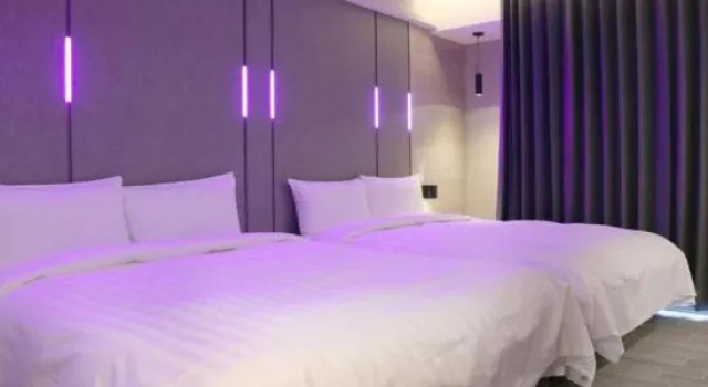 Четырёхместный номер Standard с балконом KIWI SHARE HOTEL ZHONGLI