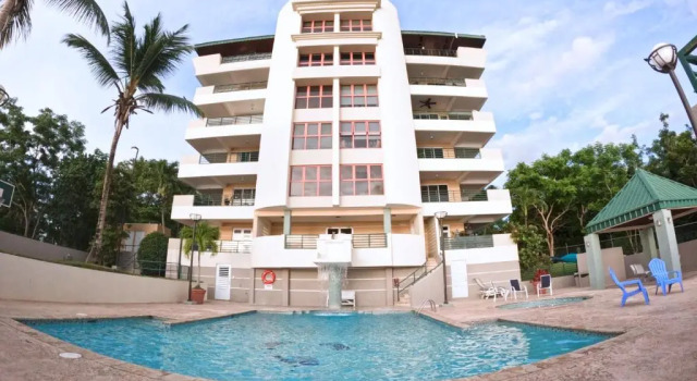 Апартаменты In Joyuda Beach, Apartment with Pool & Basketball Court