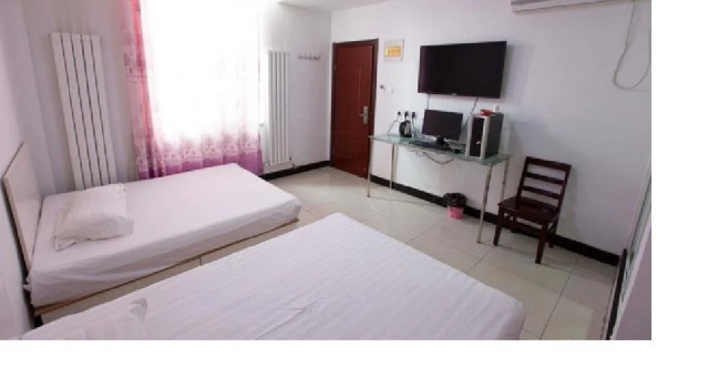 Jianguolu Inn, Book Hotel Hoteller i Tangshan med parkering, Parkering