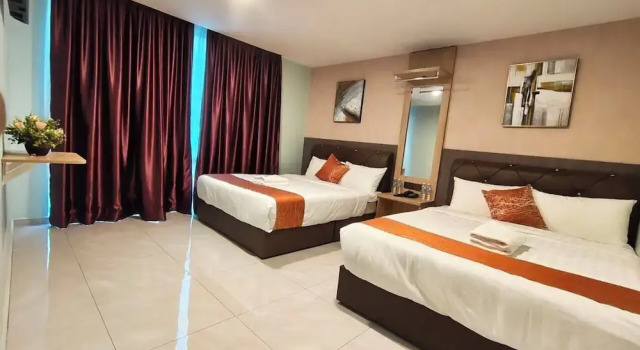 Четырёхместный номер Deluxe Hotel Mawar Inn