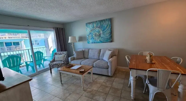 Коттедж Top Floor Beachside Condo in Gulf Shores Sleeps 6