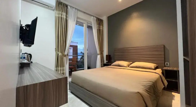 Номер Deluxe PURNAMA BALIGE HOTEL