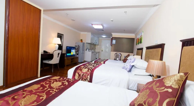 Трёхместный номер Deluxe YOYO International Apartment
